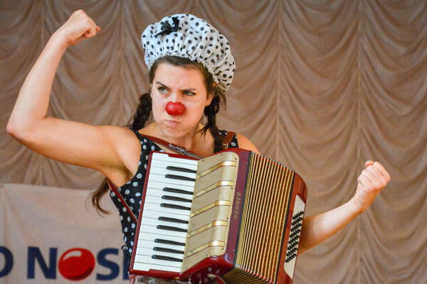 female clown with accordion 